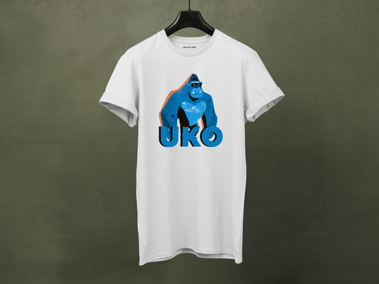 White t-shirt with blue gorilla graphic and 'UKO' text on a dark background