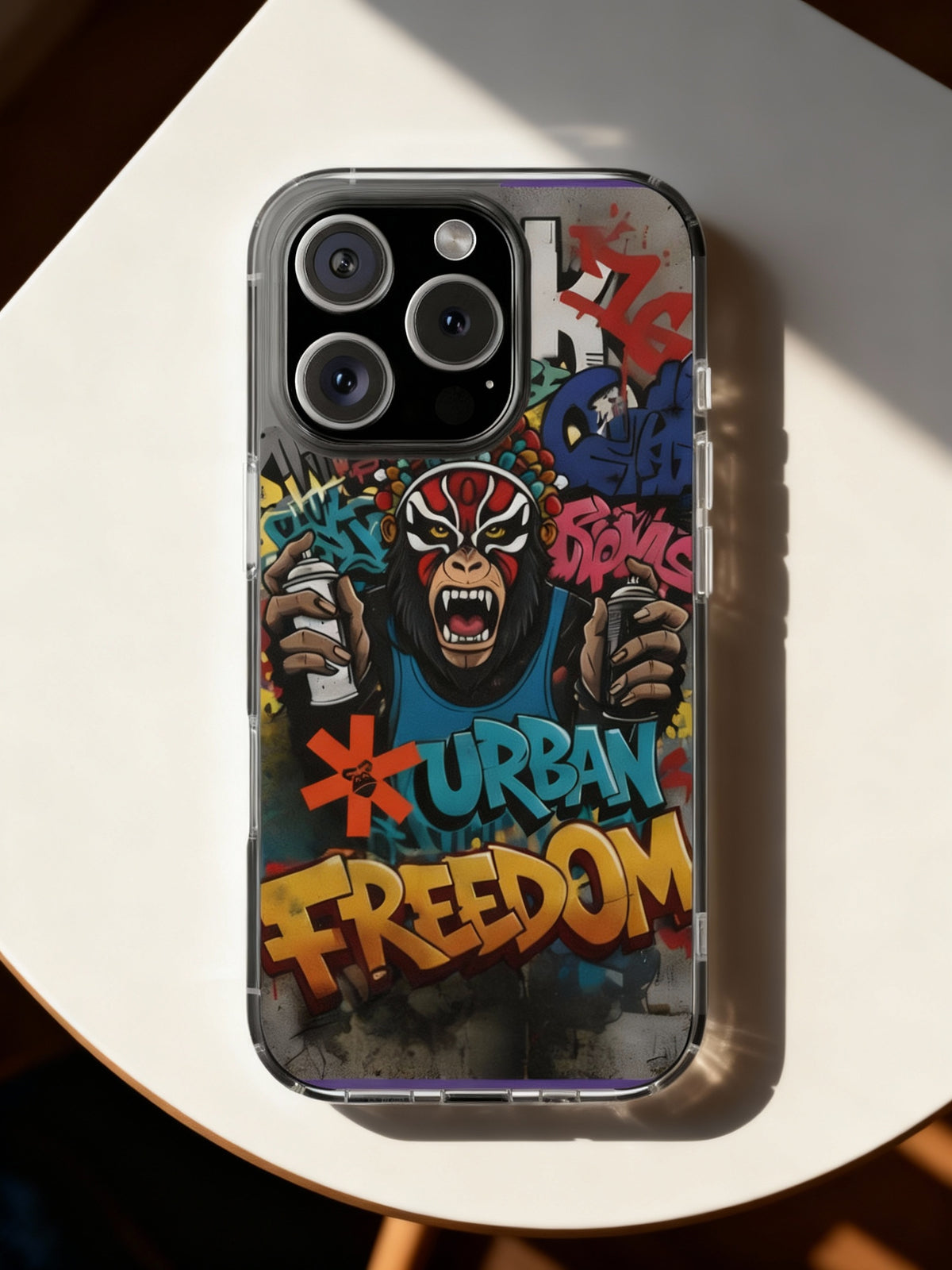 Phone case with a colorful design featuring a character and the text 'Urban Freedom' on a white surface.