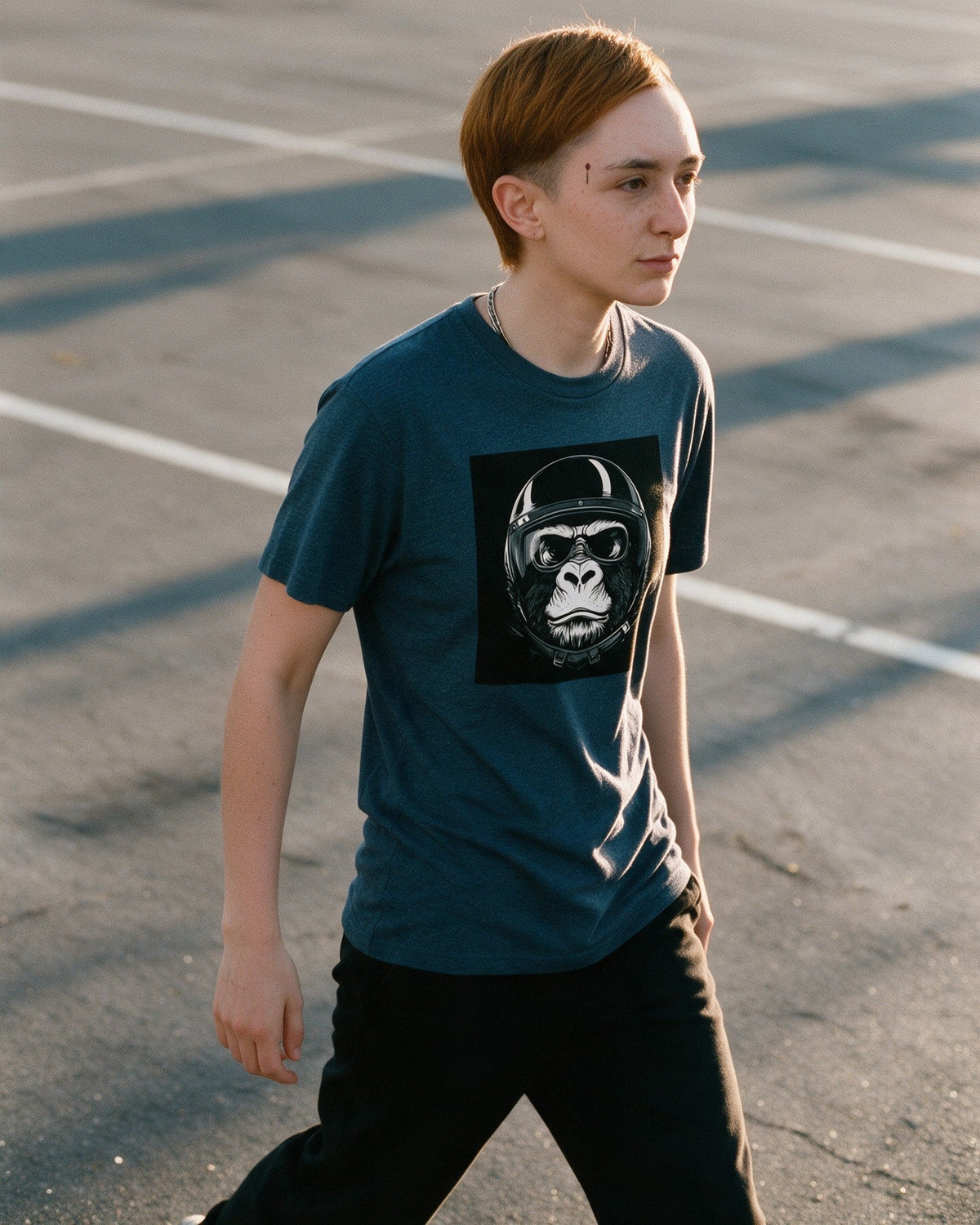 King of the Road T-Shirt in Heather Indigo worn on the street — Urban Kong