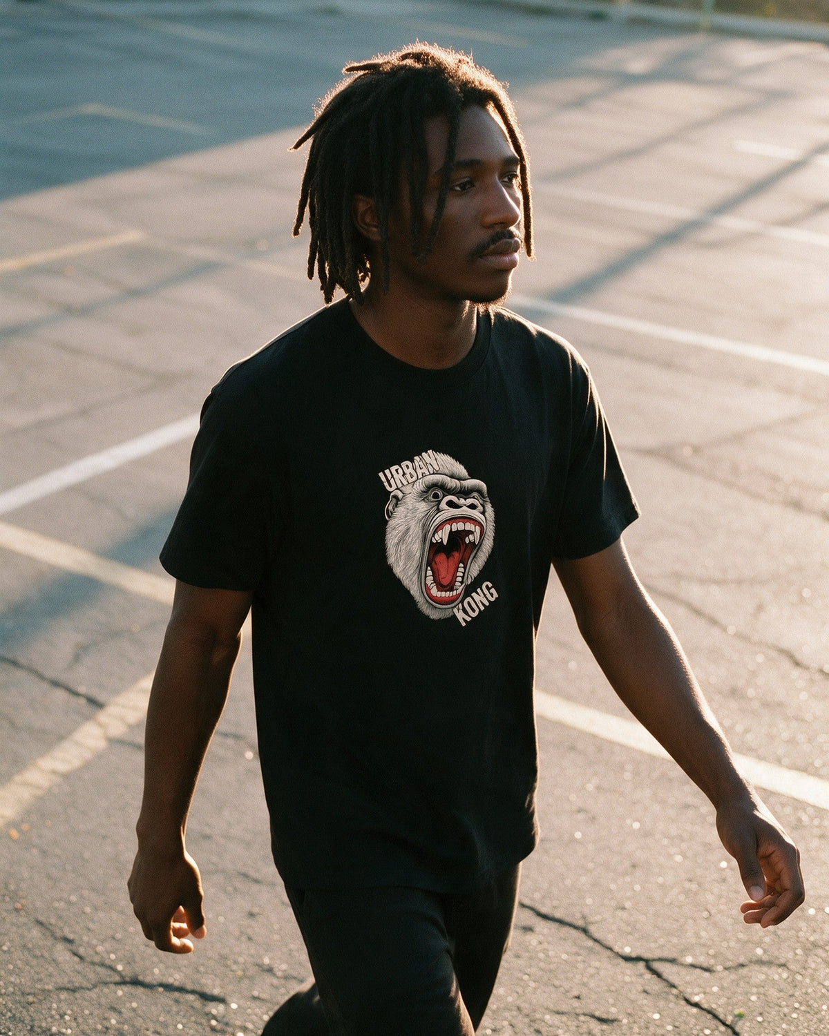 White Kong T-shirt in Black worn on the street — Urban Kong