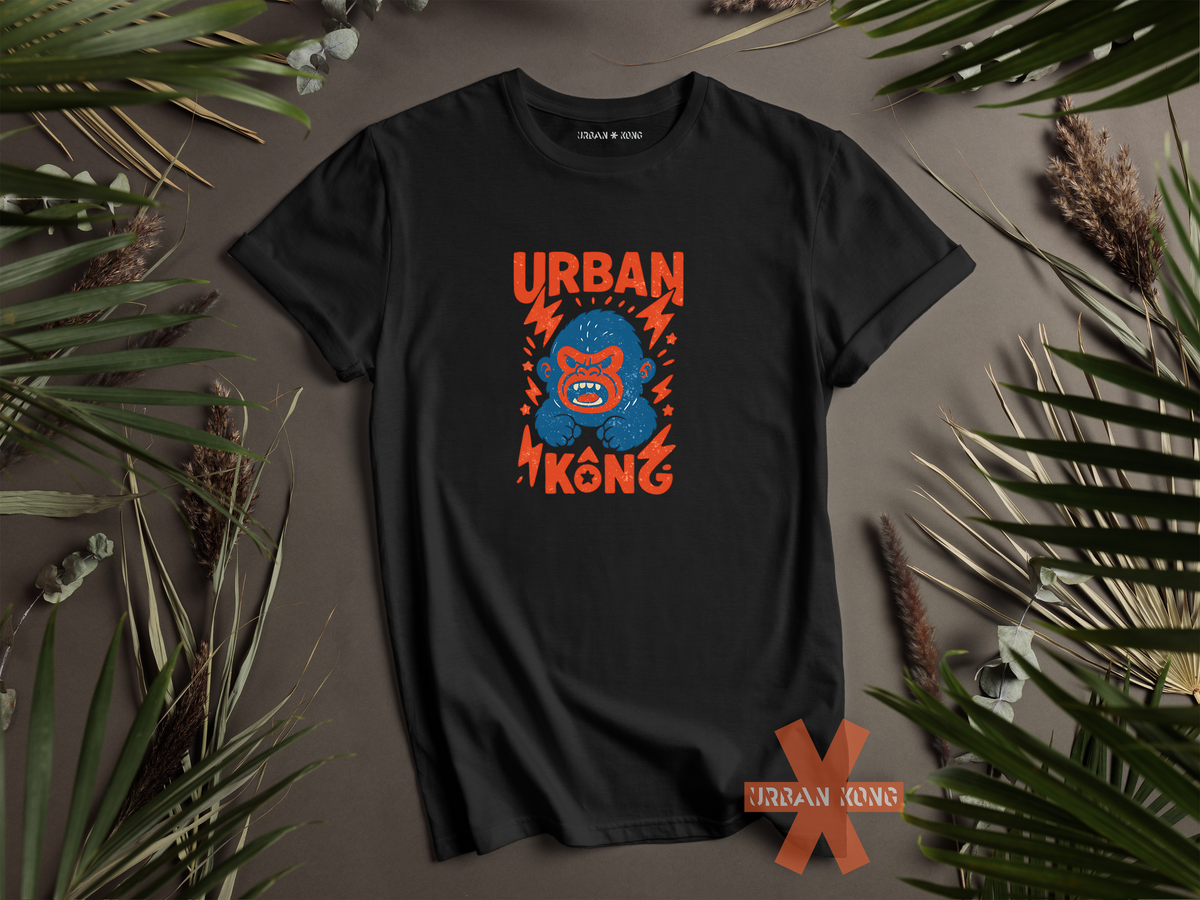 Black streetwear t-shirt with a graphic of vibrant blue cartoon gorilla head, surrounded by red lightning bolts and stars, and the 'URBAN KONG' text in distressed red.