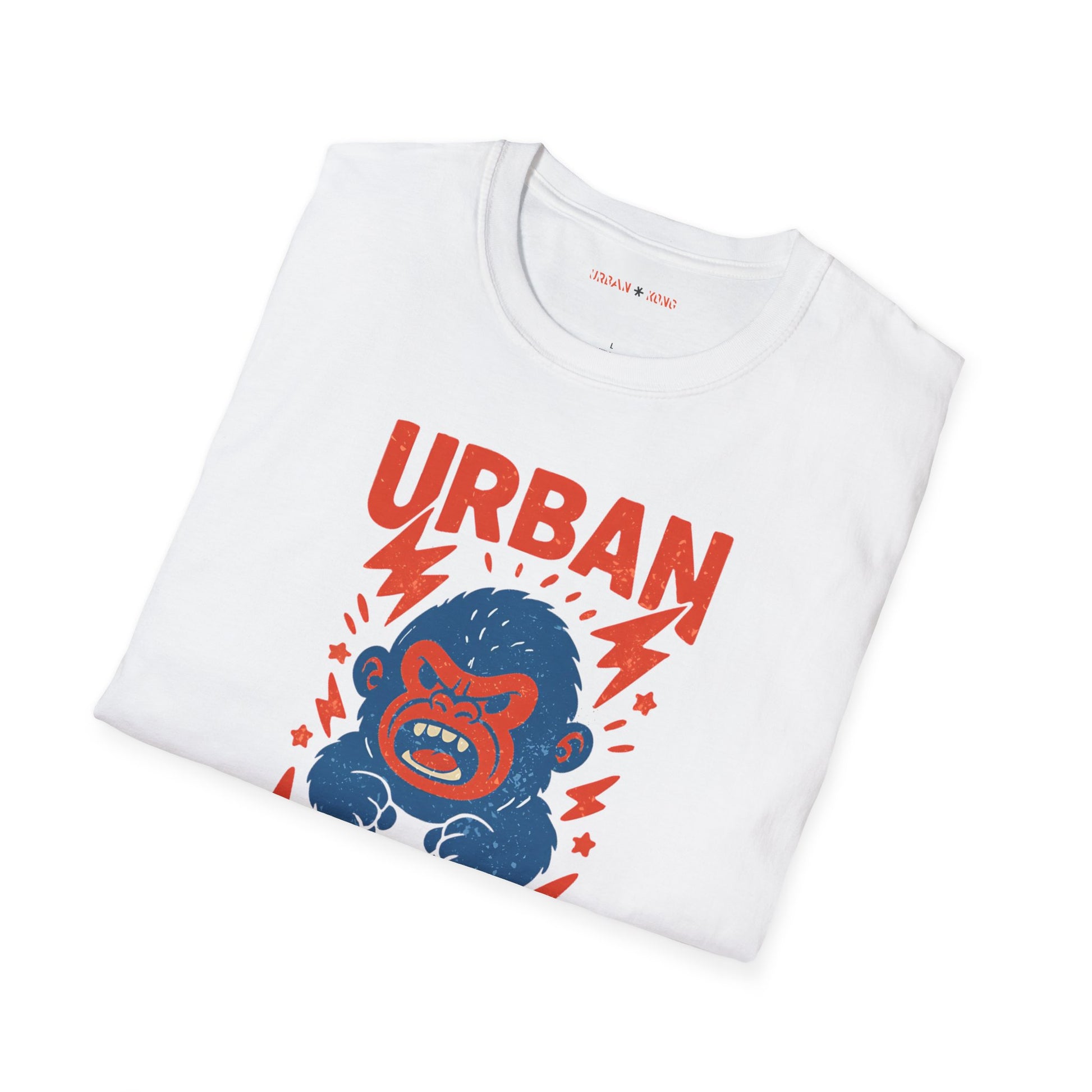 Folded white streetwear t-shirt with a graphic of vibrant blue cartoon gorilla head, surrounded by red lightning bolts and stars, and the 'URBAN KONG' text in distressed red.