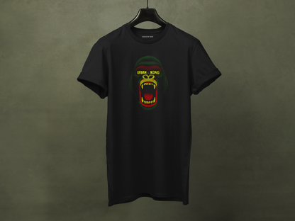 Black streetwear t-shirt Urban Kong with a roaring gorilla made in red yellow green dots on a hanger.