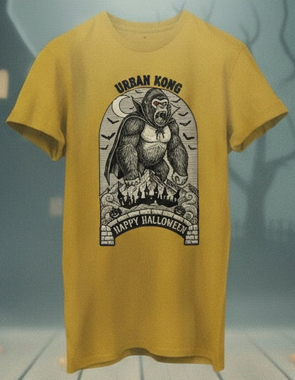Yellow t-shirt with a gorilla graphic and 'Happy Halloween' text on a Halloween-themed background with pumpkins and a haunted house.