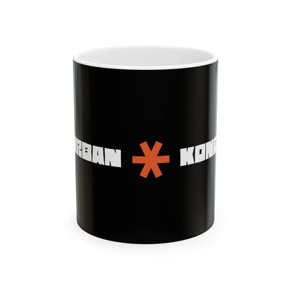 Black mug with a red asterisk and white text on a white background