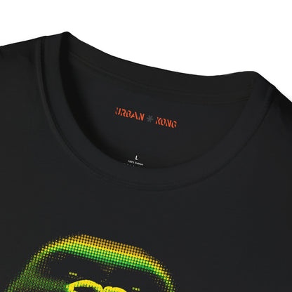 Label closeup of black t-shirt featuring a pixelated art gorilla graphic in green, yellow, and red, with the text 'URBAN KONG' below in matching colors.