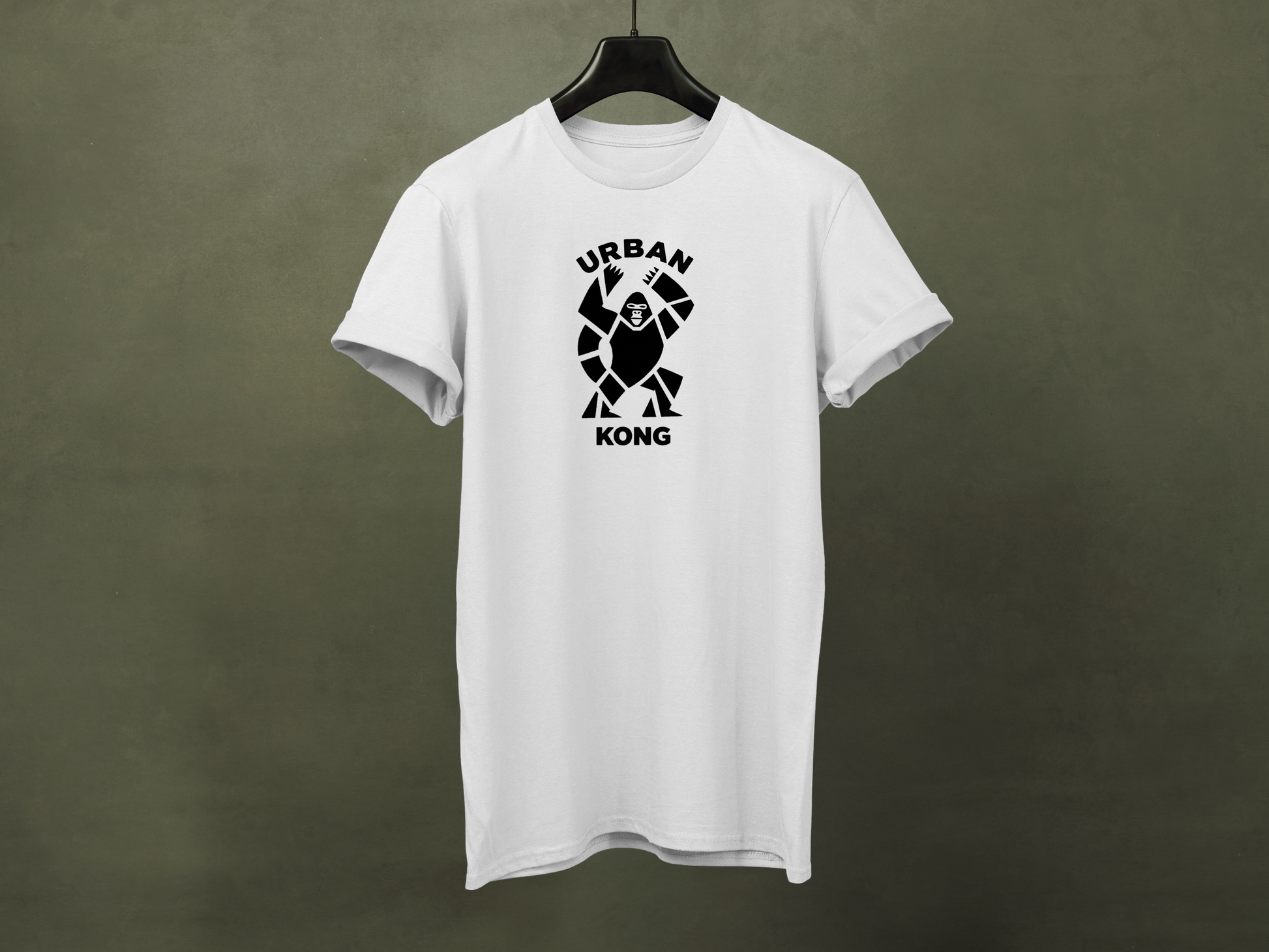 Hanged white streetwear t-shirt featuring a stylised graphic of a roaring gorilla in black 'URBAN' text above his head and  'KONG' below.