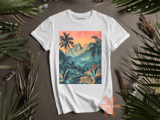 White t-shirt with a tropical landscape design on a gray background with leaves.