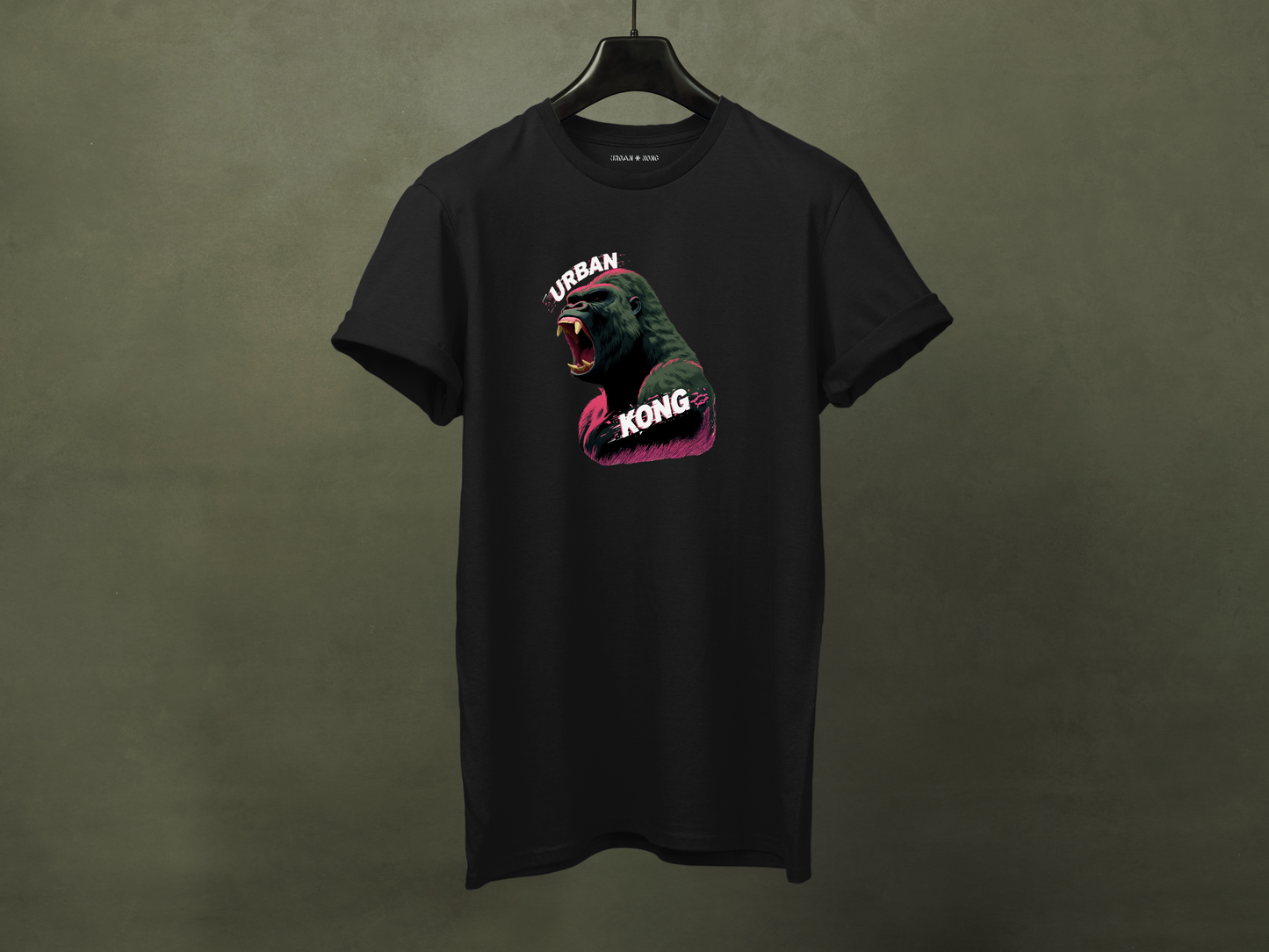 Hanged black streetwear t-shirt featuring a graphic of a roaring gorilla in green and purple with 'URBAN' text above his head and  'KONG' below.