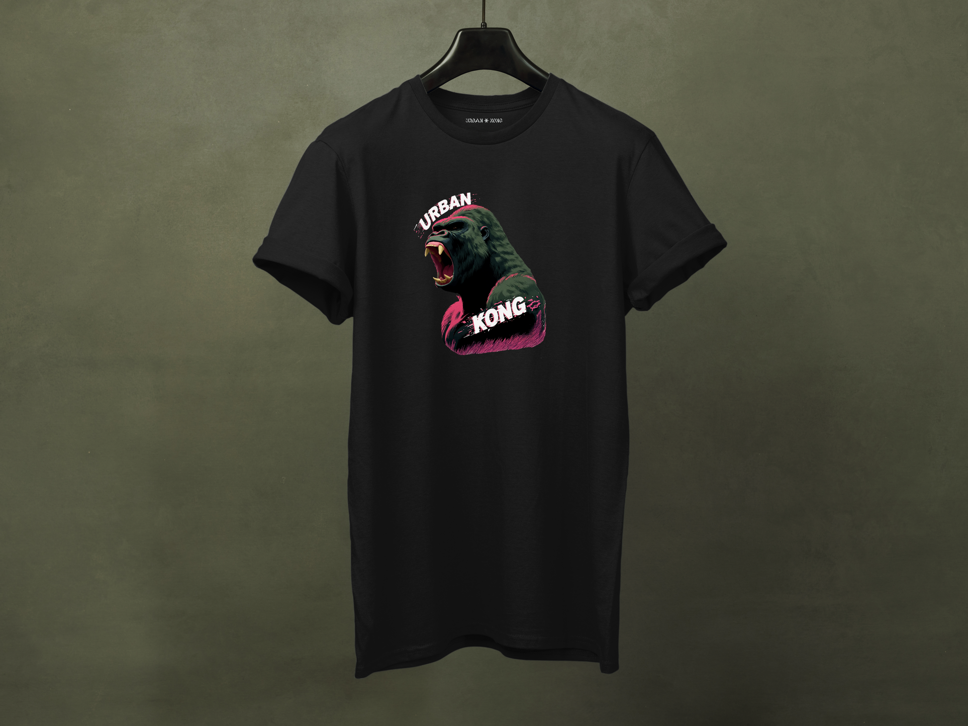 Hanged black streetwear t-shirt featuring a graphic of a roaring gorilla in green and purple with 'URBAN' text above his head and  'KONG' below.