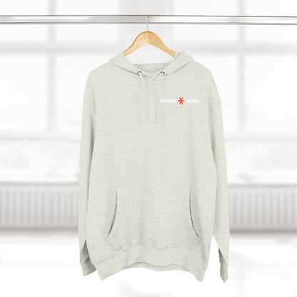 Light gray hoodie with a small red and white logo on a wooden hanger against a white background.