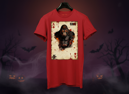 Red t-shirt with a graphic design of a monkey on a card against a Halloween-themed background.