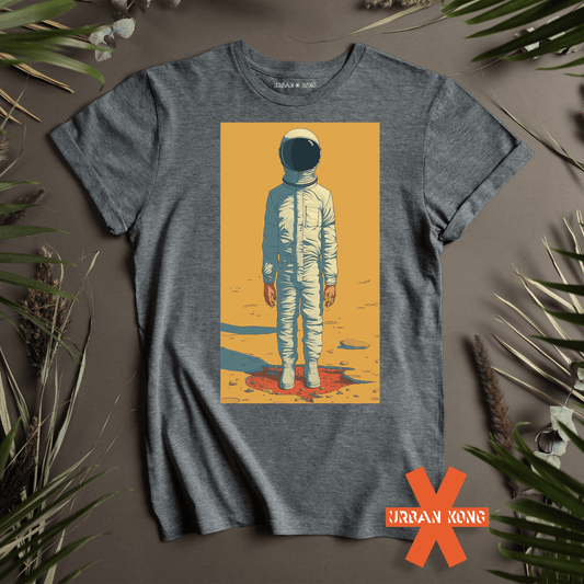 A gray t-shirt featuring a front graphic print of an astronaut on an alien planet with a yellow tinted sky.