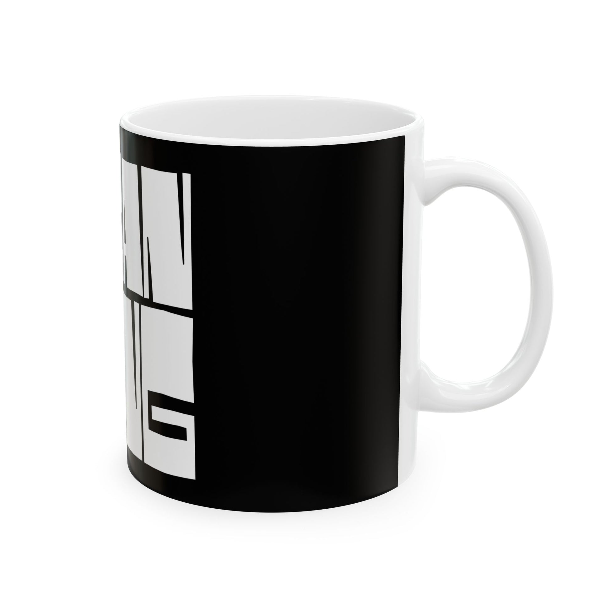 Black mug with white text on a white background