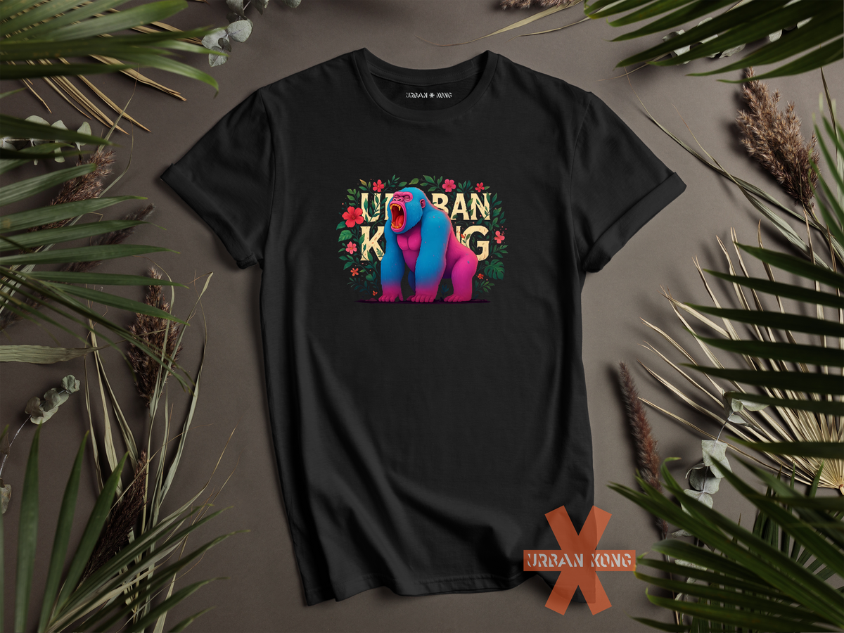 Black streetwear t-shirt featuring a colourful neon graphic of a gorilla with pink and blue fur, sitting and roaring, surrounded by floral elements. The 'URBAN KONG' text is integrated into the floral border.
