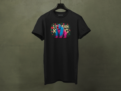 Hanged black streetwear t-shirt featuring a colourful neon graphic of a gorilla with pink and blue fur, sitting and roaring, surrounded by floral elements. The 'URBAN KONG' text is integrated into the floral border.