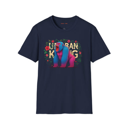 Blue streetwear t-shirt featuring a colourful neon graphic of a gorilla with pink and blue fur, sitting and roaring, surrounded by floral elements. The 'URBAN KONG' text is integrated into the floral border.