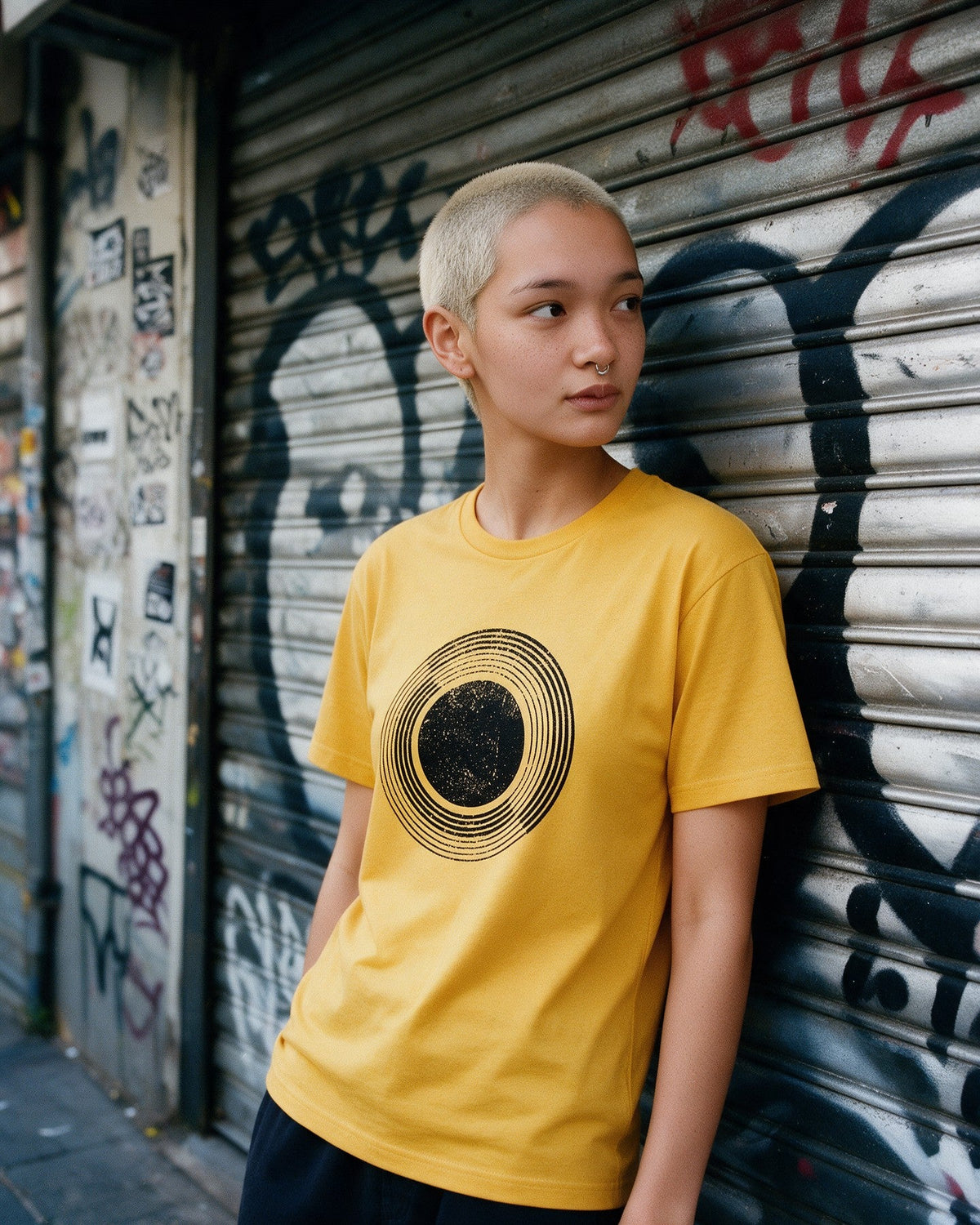 Celestial Sphere T-Shirt in Gold worn on the street — Urban Kong