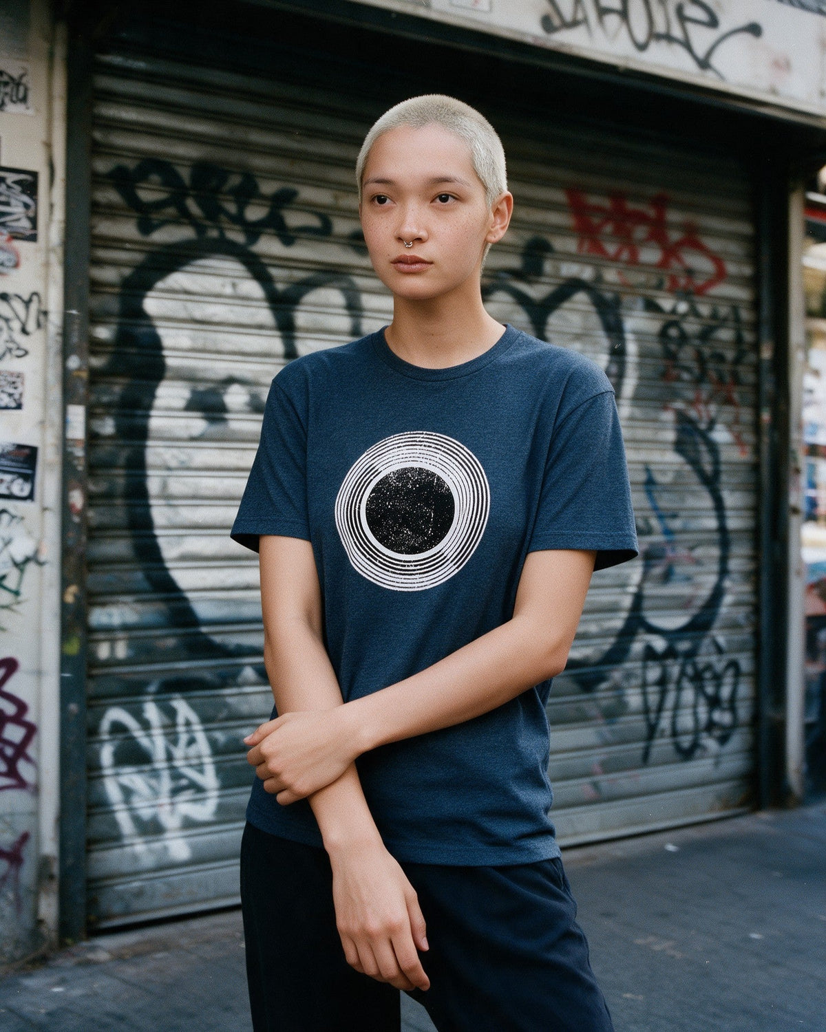 Celestial Sphere T-Shirt in Heather Navy worn on the street — Urban Kong