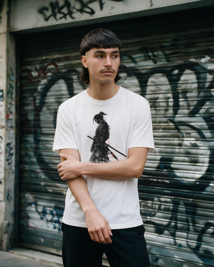 Dharma T-Shirt in White worn on the street — Urban Kong