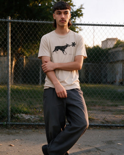 Dober Bite T-Shirt in Sand worn on the street — Urban Kong