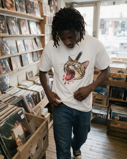Feral Cat T-Shirt in White worn on the street — Urban Kong