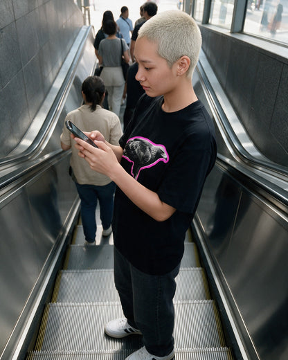 Glow Falcon T-Shirt in Black worn on the street — Urban Kong