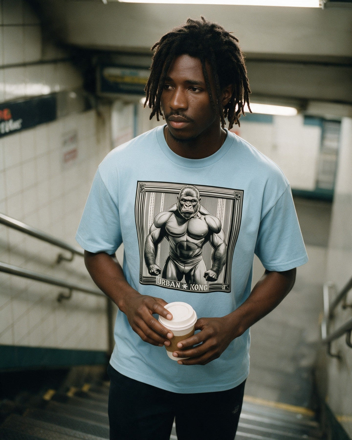 Jungle Muscle T-Shirt in Light Blue worn on the street — Urban Kong