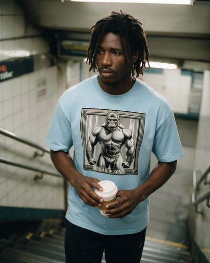Jungle Muscle T-Shirt in Light Blue worn on the street — Urban Kong
