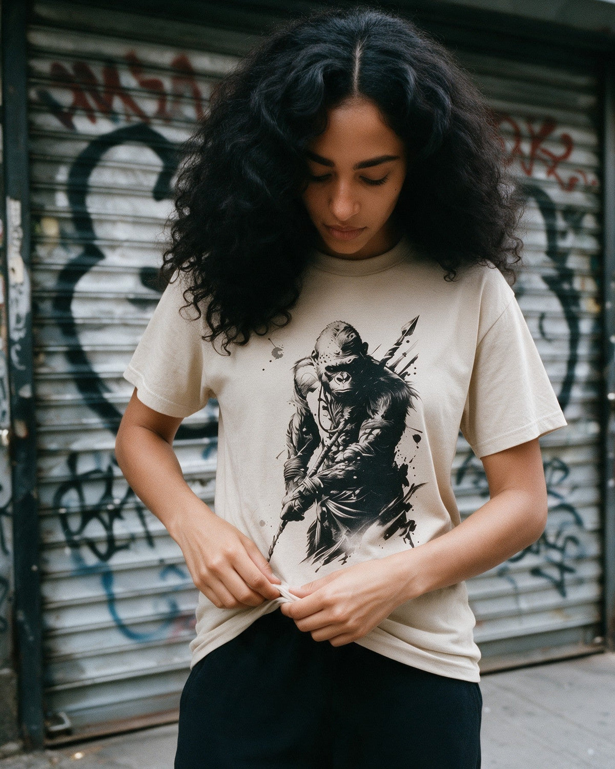Kongqueror T-Shirt in Sand worn on the street — Urban Kong