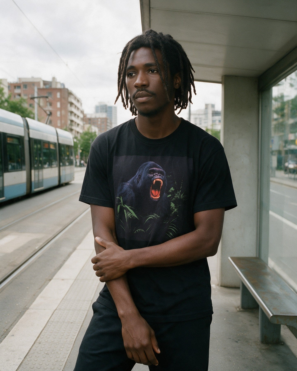 Savage Strength T-Shirt in Black worn on the street — Urban Kong