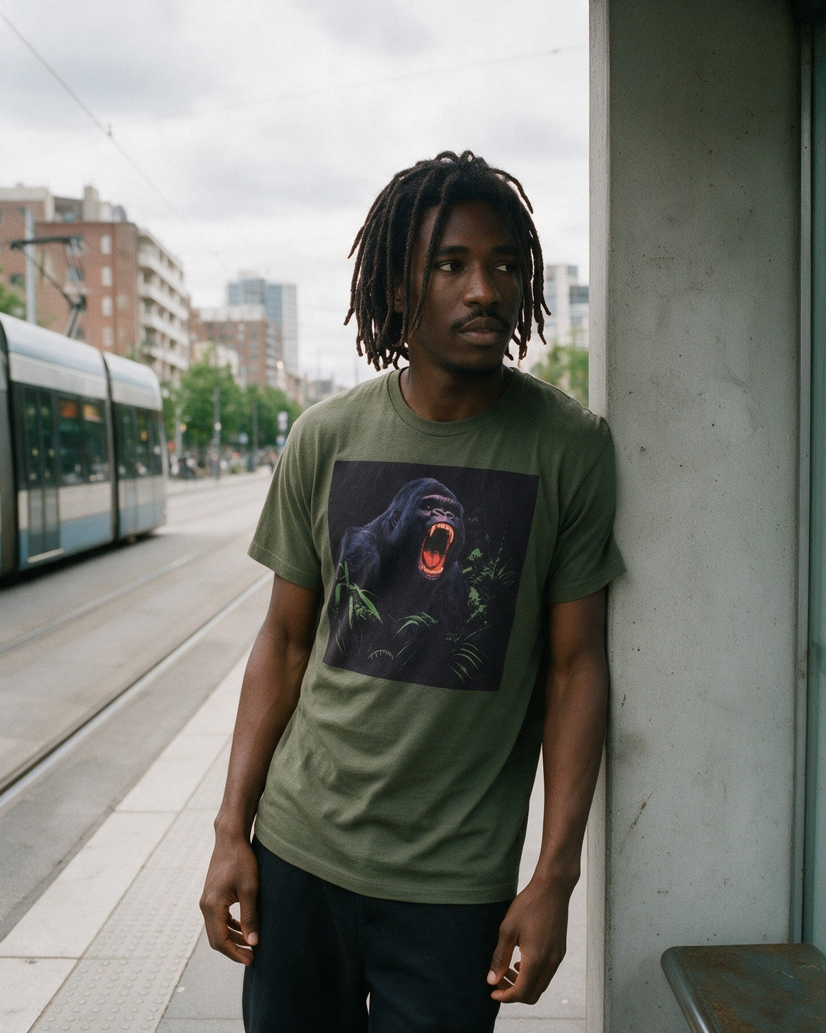 Savage Strength T-Shirt in Military Green worn on the street — Urban Kong