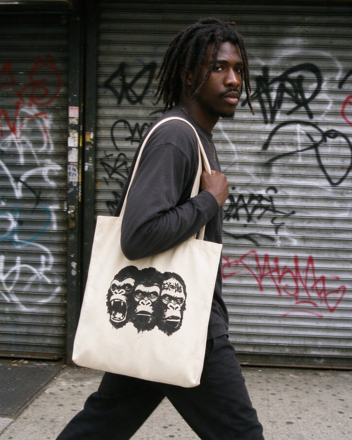 Kong Trinity Tote Bag worn on the street — Urban Kong