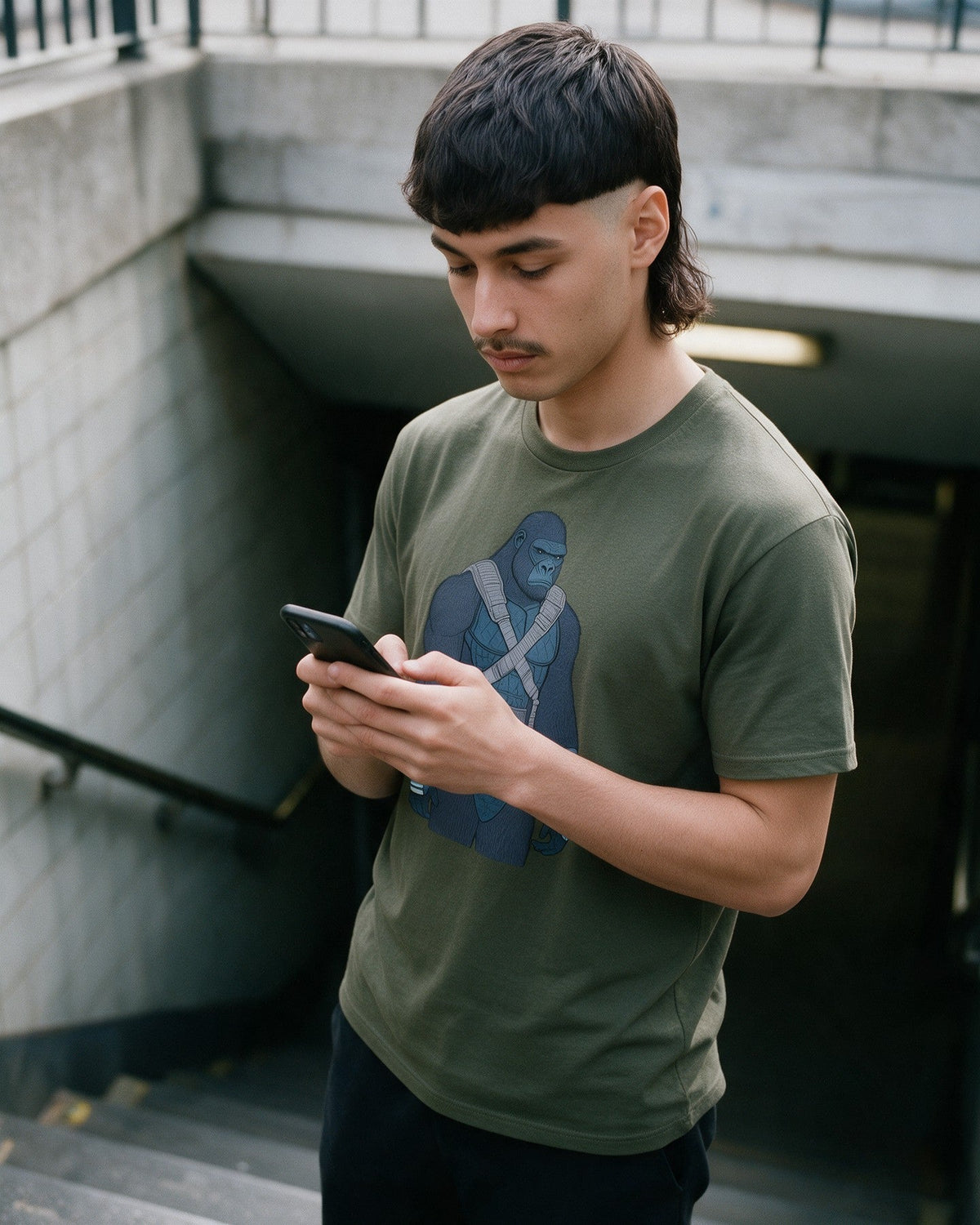 Galactic Kong T-Shirt in Military Green worn on the street — Urban Kong